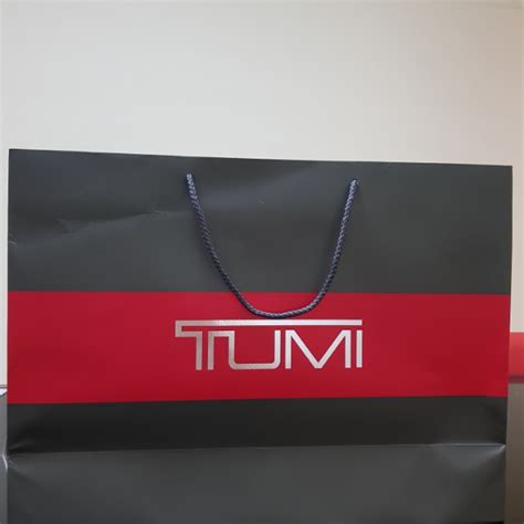 tumi paper bag policy.